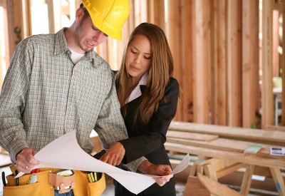 Calgary construction plans - man and woman