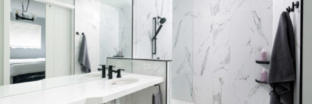 white bathroom renovation by home renovation company in Calgary