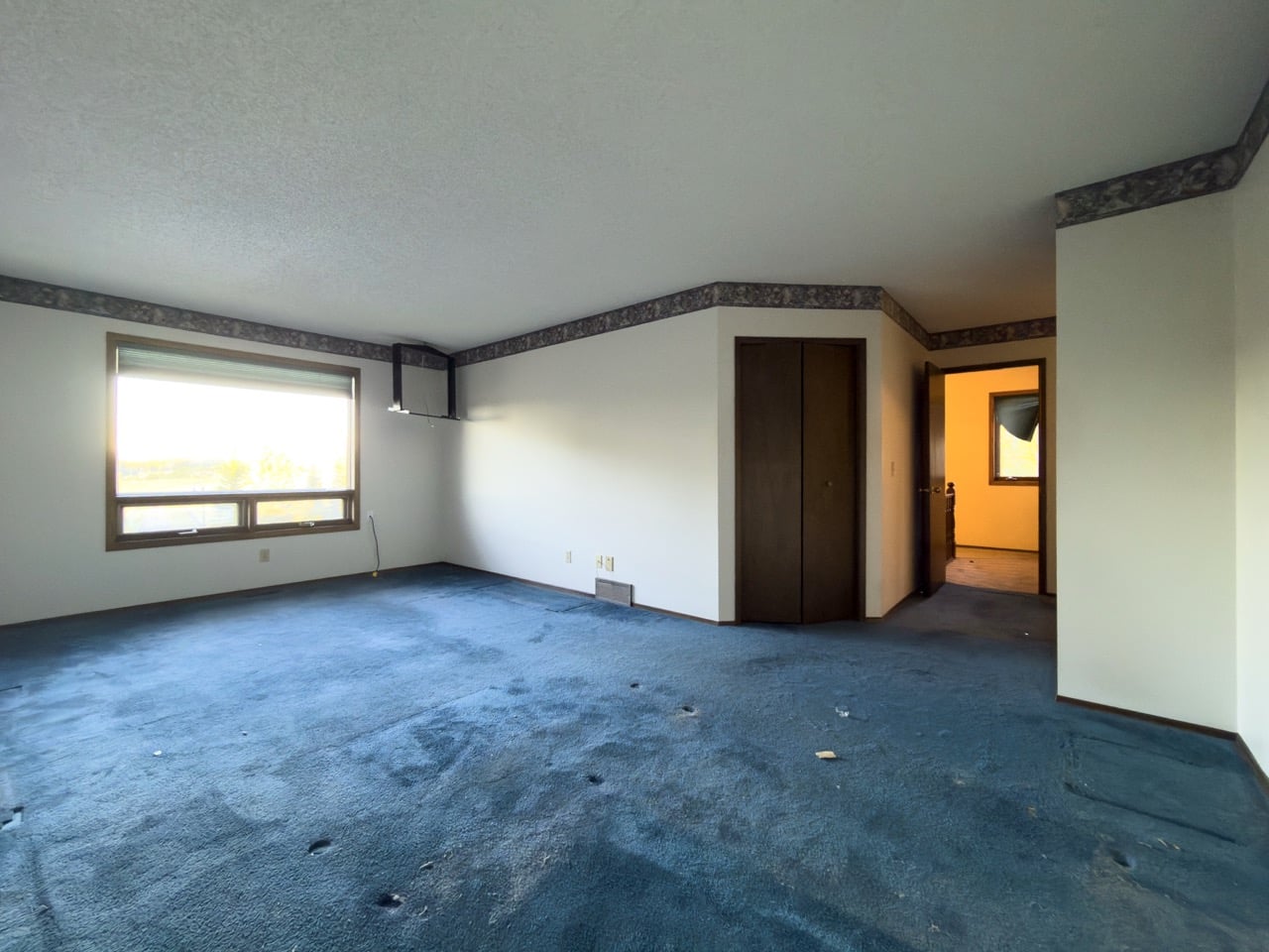 Priddis, Alberta Renovation Photo Gallery - 065 - Primary Bedroom Before