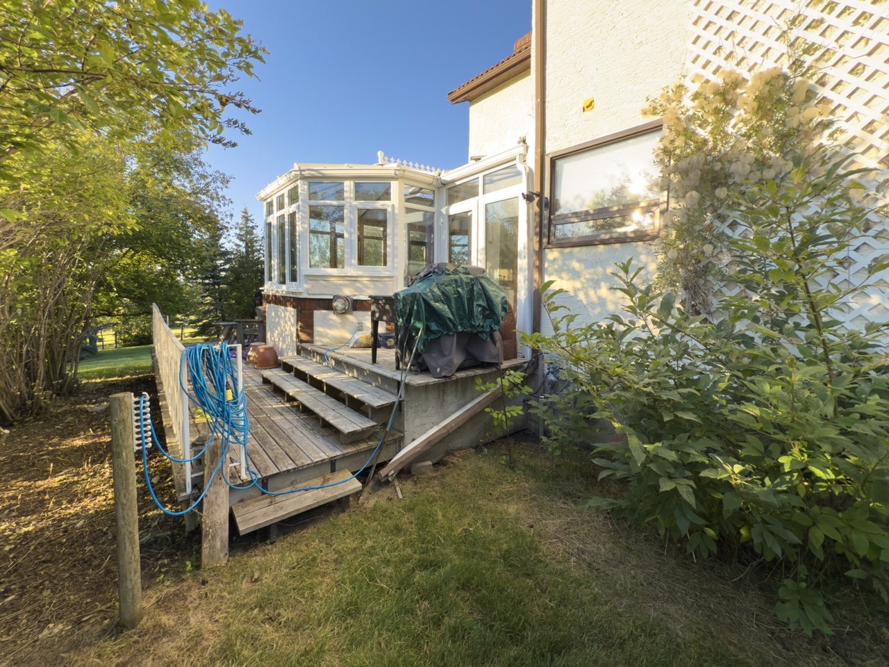 Priddis, Alberta Renovation Photo Gallery - 065 - Exterior before